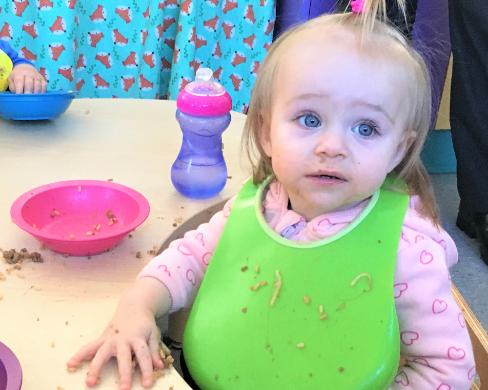 girl at meal table 